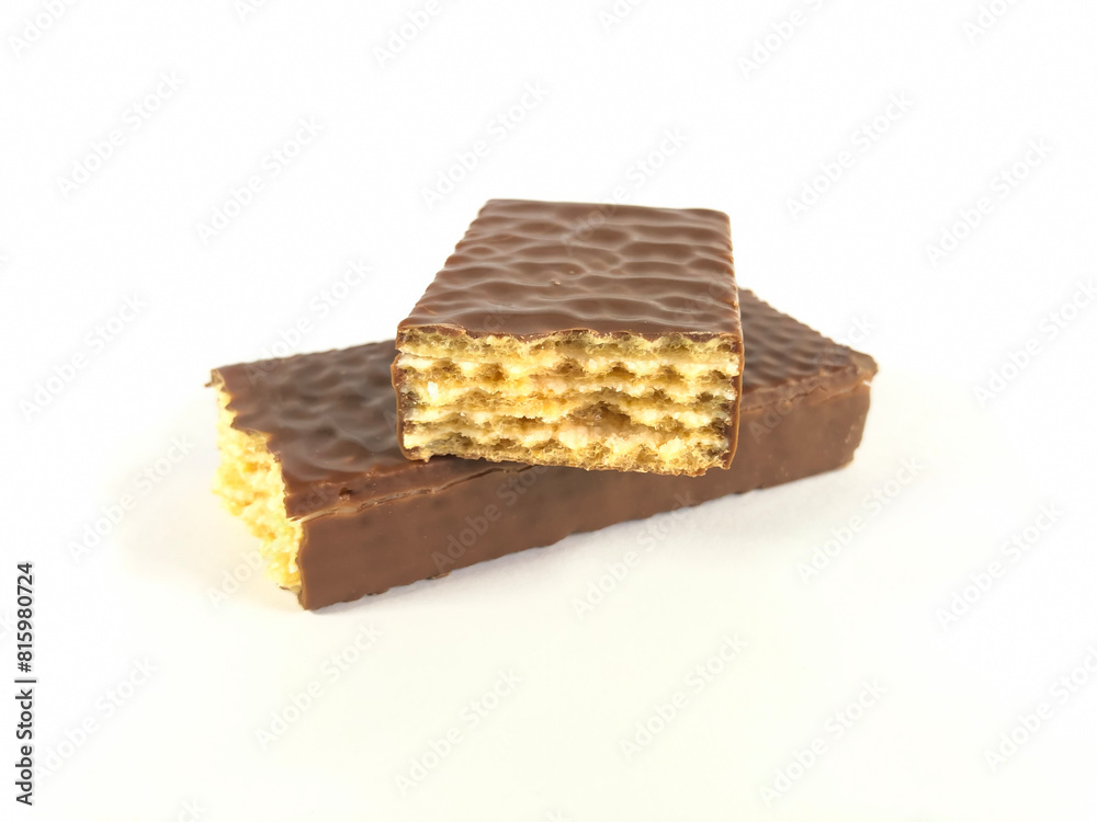 Chocolate wafer on white background broken and delicious Chocolate wafer on white background broken and delicious