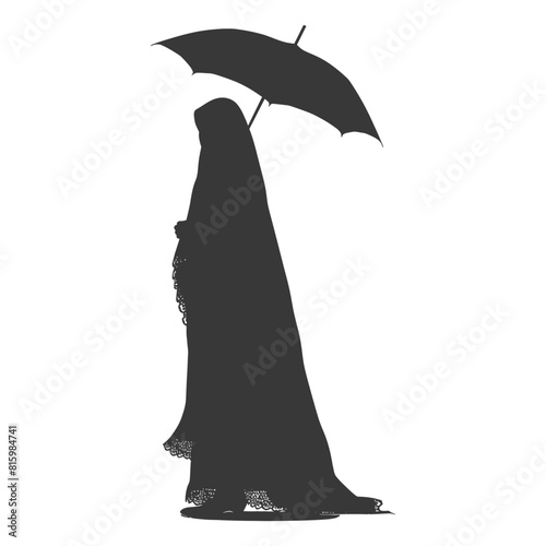 Silhouette independent emirates women wearing Abaya with umbrella black color only