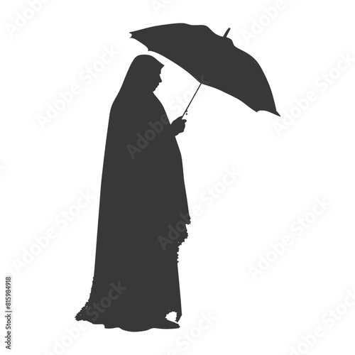Silhouette independent emirates women wearing Abaya with umbrella black color only