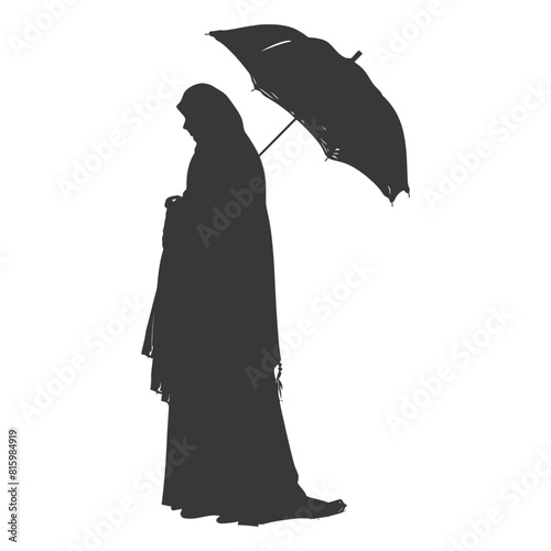 Silhouette independent emirates women wearing Abaya with umbrella black color only