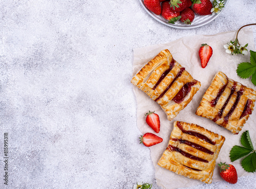 Sweet puff pastry cakes with strawberry © Yulia Furman
