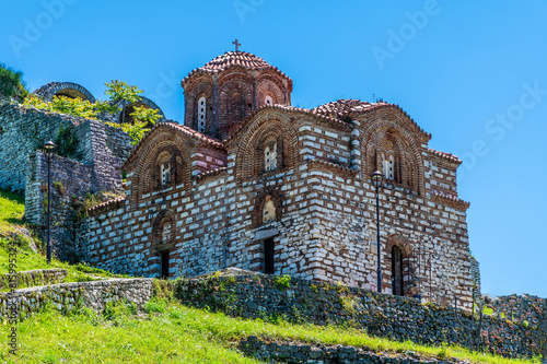 A view in the castle towards Saint Theodores Church above the city of Berat, Albania in summertime