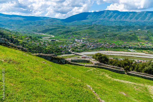 A view from the castle towards a bend in the Osum river above the city of Berat, Albania in summertime