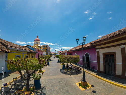Beautiful view of the colonial city of Granada Nicaragua, Its majestic yellow cathedral, Guadalupe Church, the convent museum anda the calzada streets photo