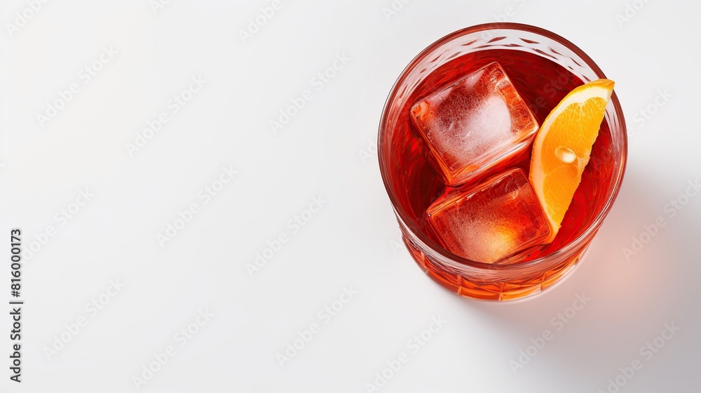 Negroni Cocktail in crystal glass with ice cubes and orange slice on white background Negroni Cocktail in crystal glass with ice cubes and orange slice on white background
