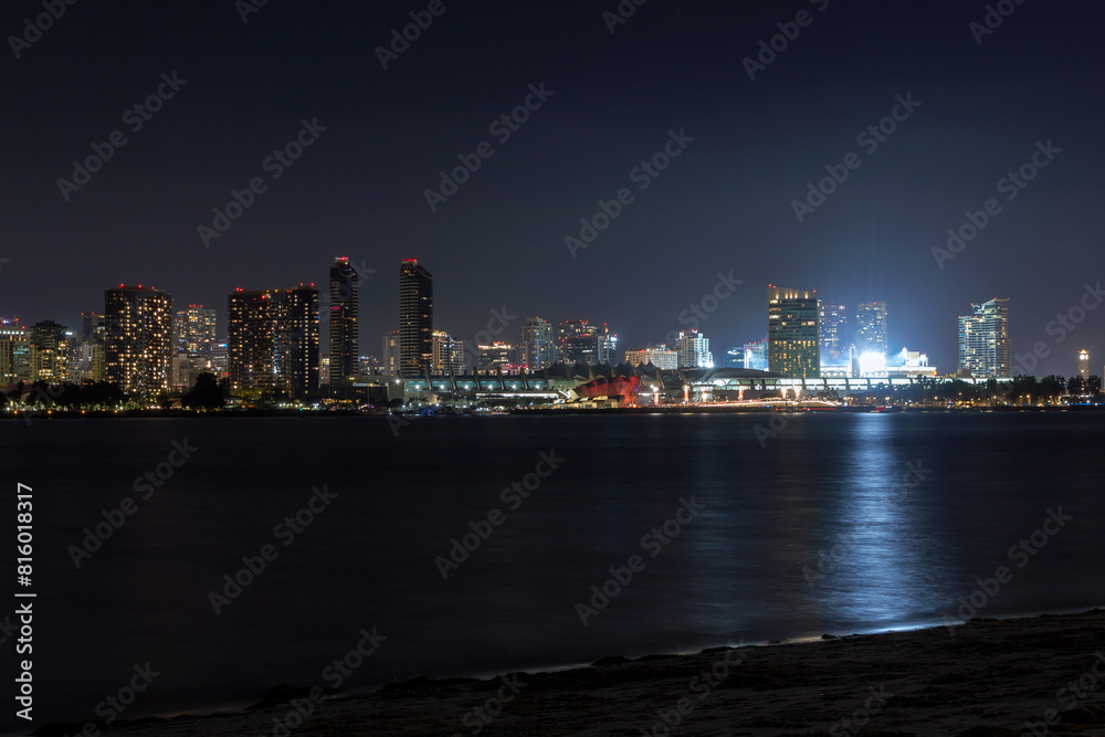 the iconic and breathtaking skyline of San Diego downtown at night. With a thousand lights on the big Towers