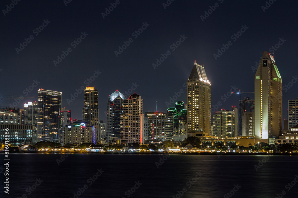 the iconic and breathtaking skyline of San Diego downtown at night. With a thousand lights on the big Towers