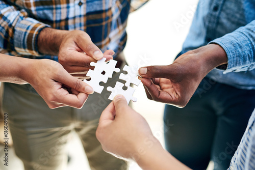 Puzzle, company and hands for connection, planning and teamwork for hope and goals. Partnership, collaboration and trust for business, solutions and vision for support, idea and investment for people