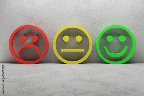 green happy smiley, yellow neutral smiley and red sad or negative smiley in a white concrete room
