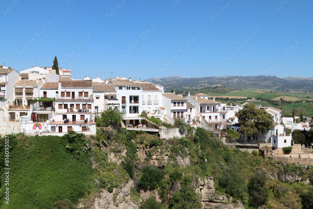 Scenic view of ronda's cliffside buildings and bridge Scenic view of ronda's cliffside buildings and bridge