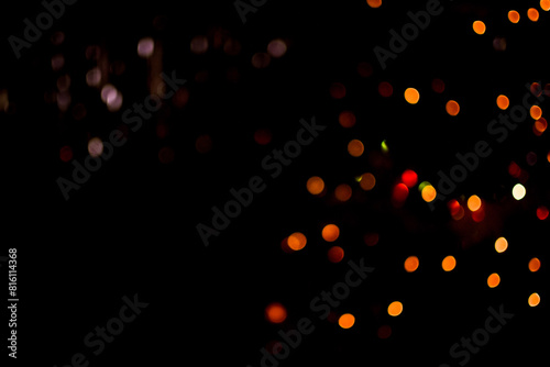 dark abstract bokeh background. colorful lights