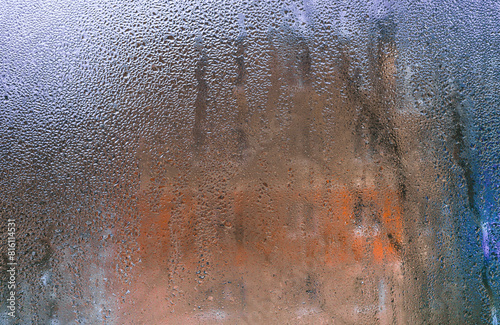 wet glass background. drops on the glass