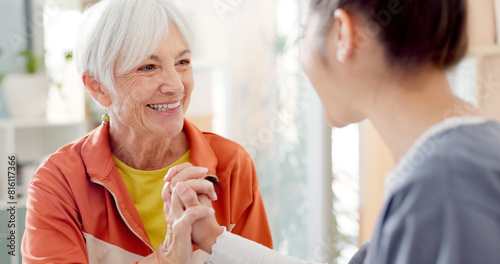 High five, happy and a senior woman with a doctor for rehabilitation success and healthcare support. Smile, celebration and an elderly patient with a medical employee and gesture for therapy progress photo