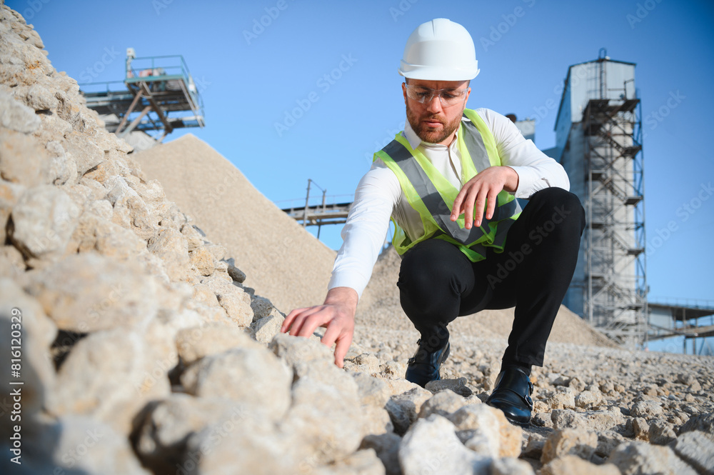 Engineer at the Crushed stone production plant. Gravel