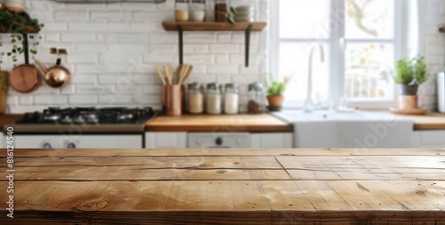 Wooden texture of a kitchen table with a blurred kitchen interior  great for wallpaper or background