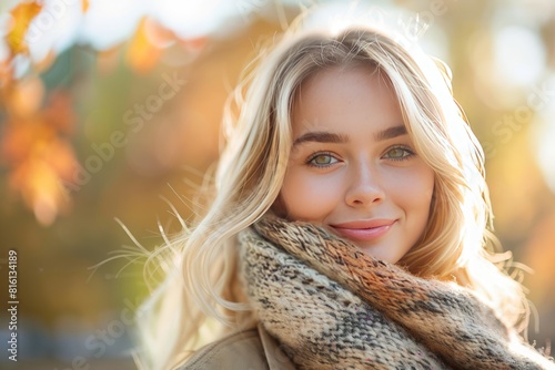 Closeup of beautiful woman wearing coat and scarf.