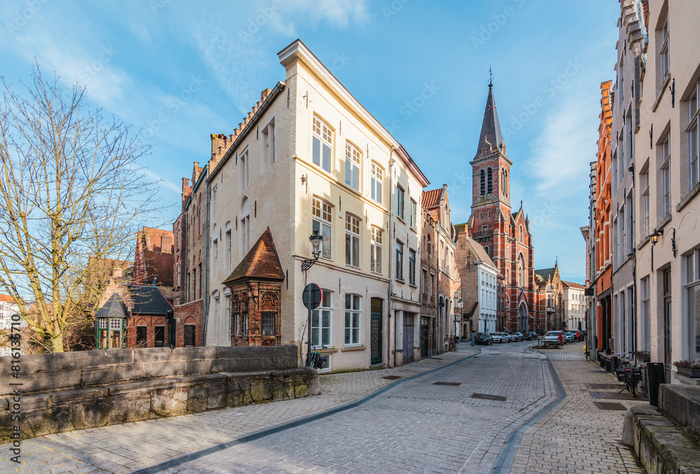 Narrow street with terraced houses in city center of Bruges, Belgium. Narrow street with terraced houses in city center of Bruges, Belgium.