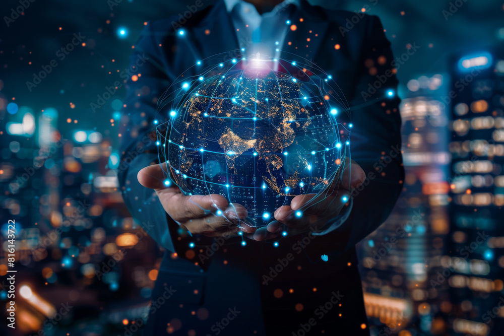 A man in a suit is holding a globe in his hands A man in a suit is holding a globe in his hands