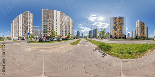 Fototapeta Naklejka Na Ścianę i Meble -  hdri 360 panorama near skyscraper multistory buildings of residential quarter complex in full equirectangular seamless spherical projection