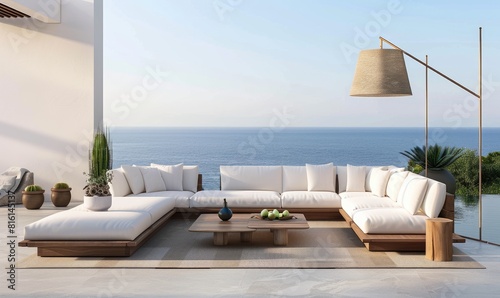 A wooden sofa with pillows on the terrace of a modern villa overlooking the sea © piai
