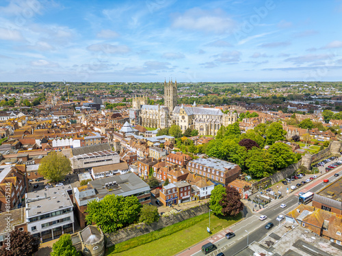 The drone aerial view of Canterbury Cathedral the city.  Christ Church Cathedral, Canterbury, is the cathedral of the archbishop of Canterbury, the leader of the Church of England.	 photo