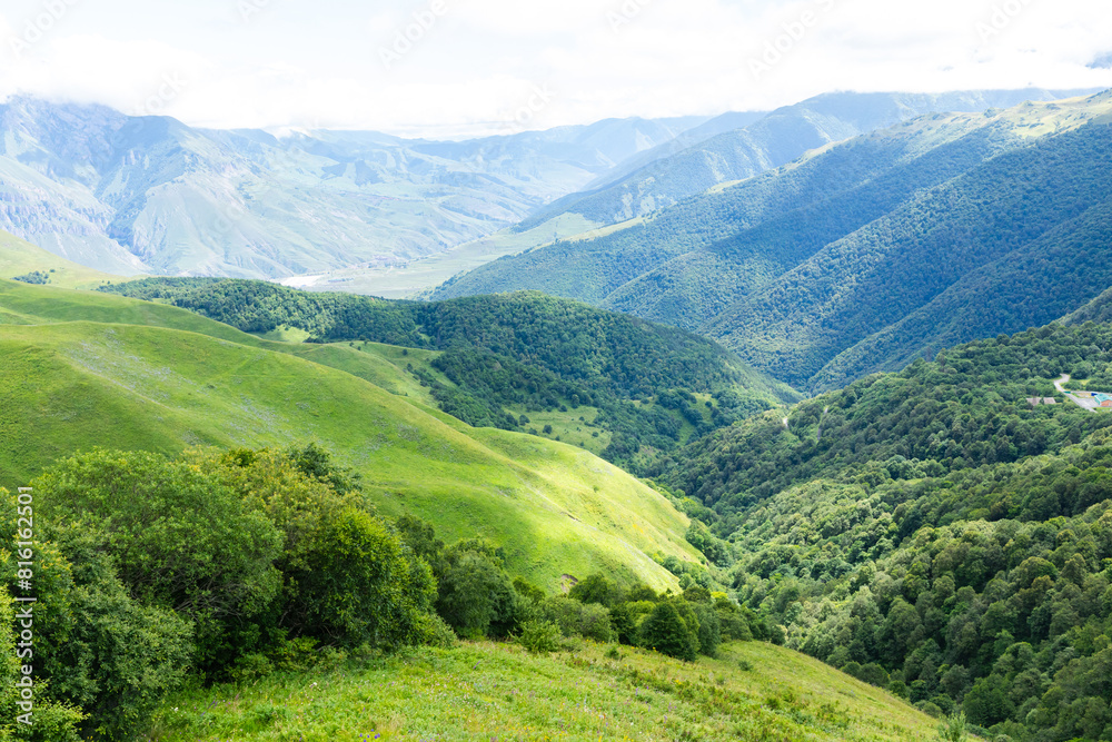Beautiful mountain landscape, North Ossetia-Alania. Caucasus mountains landscape near Saniba village, North Ossetia-Alania, Russia Beautiful mountain landscape, North Ossetia-Alania. Caucasus mountains landscape near Saniba village, North Ossetia-Alania, Russia