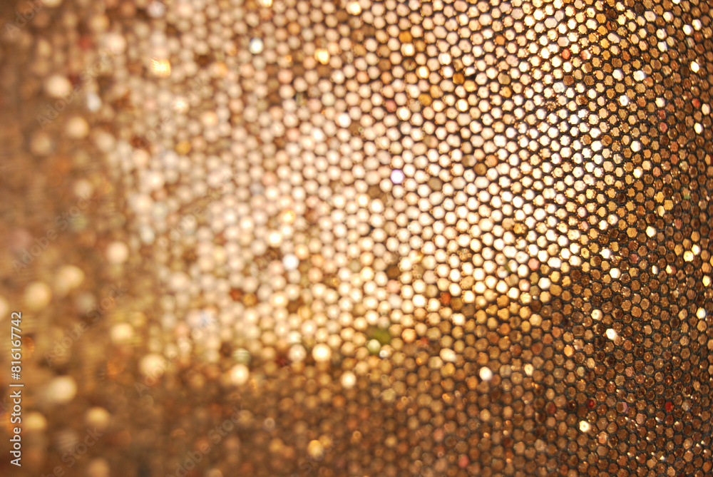 Golden overlap sequins fabric texture close up as background Golden overlap sequins fabric texture close up as background