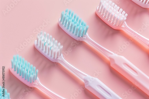 New toothbrushes on pink background
