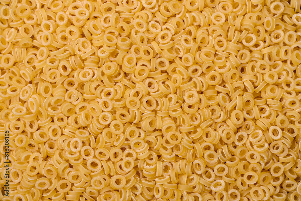 Raw anellini pasta from durum wheat with salt and spices