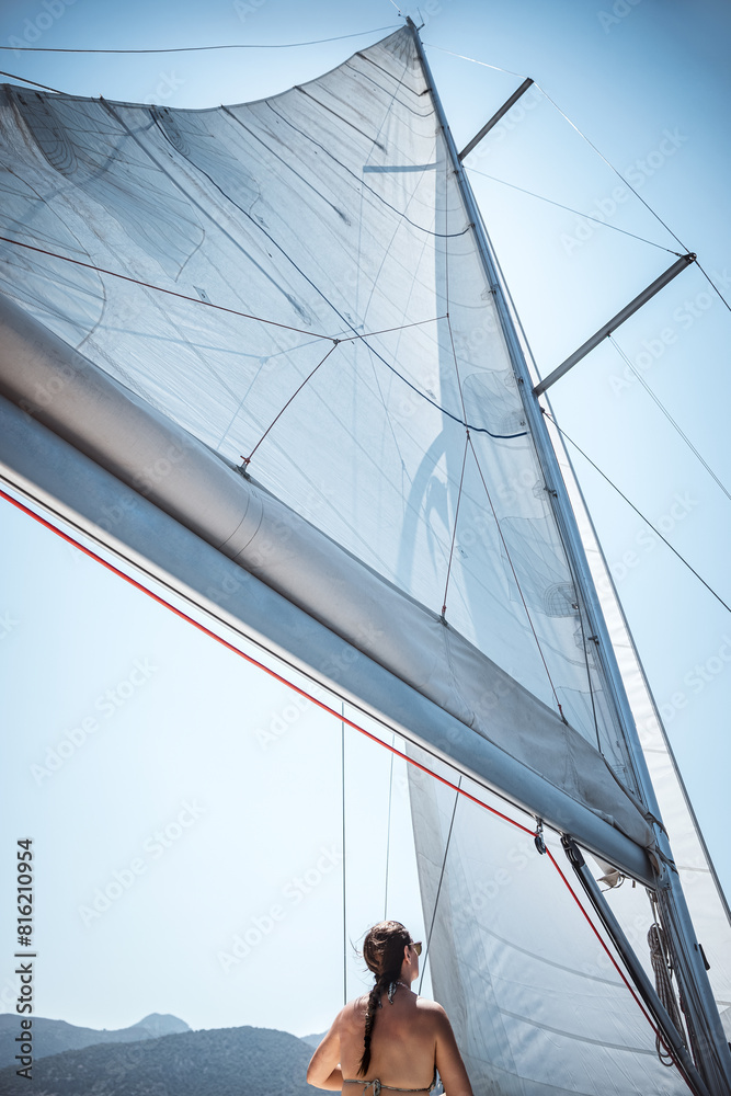 Fototapeta premium Girl Resting under White Sails