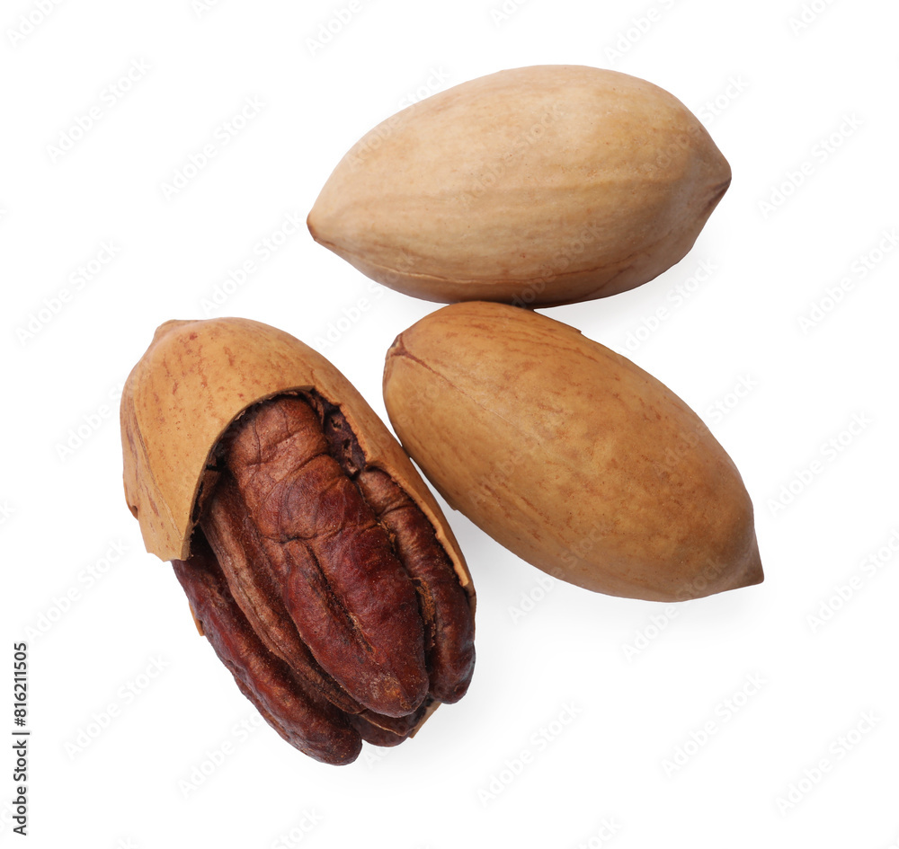 Three tasty pecan nuts isolated on white Three tasty pecan nuts isolated on white