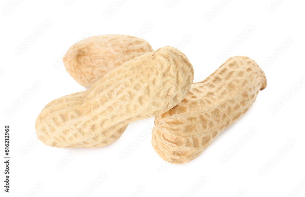 Three fresh unpeeled peanuts isolated on white Three fresh unpeeled peanuts isolated on white