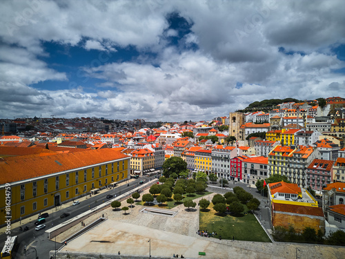 Aerial view on Lisbon's downtown Terreiro do Paço on a sunny day with fluffy clouds