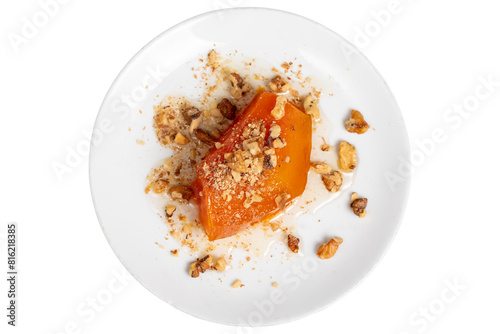 Pumpkin dessert. Turkish and Middle Eastern cuisine desserts. Ramadan food. Pumpkin dessert with sherbet isolated on white background