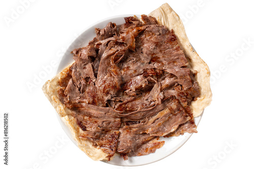 Meat doner kebab. Turkish and Middle Eastern cuisine flavors. Doner kebab isolated on white background. Local name tabakta et döner