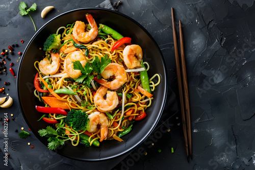 Spicy shrimp stir-fry noodles in black bowl