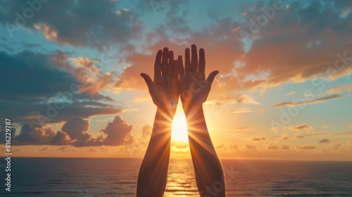 Celebrating International Yoga Day with hands raised embracing the sun against a backdrop of a sunset sky and the sea