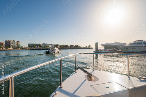 Sunny day on a yacht near Al Raha © creativefamily