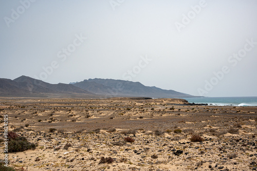Arid, volcanic landscape of the southern side of Jandia Nature Reserve, Jandia Peninsula, Fuerteventura, Spain