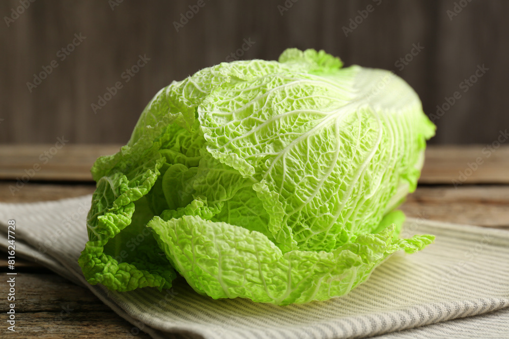 Fresh ripe Chinese cabbage on wooden table, closeup Fresh ripe Chinese cabbage on wooden table, closeup