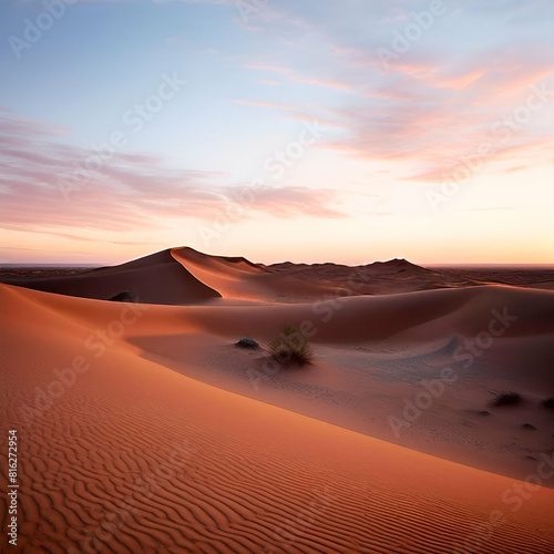 The tranquil beauty of a desert environment at dusk as the sun sets in the evening 