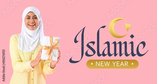 Young Muslim woman with gif...