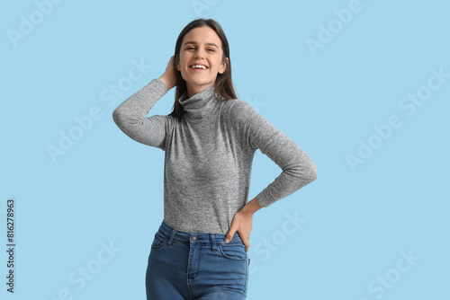 Body positive woman on blue...
