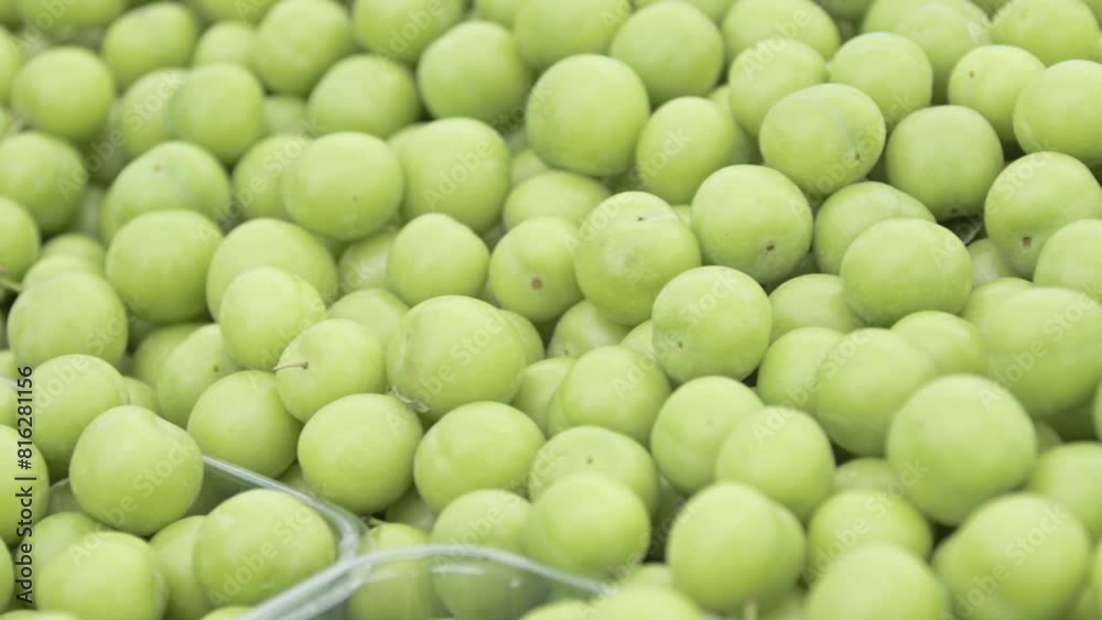 Many Pile of New Crop Plums on Market Stall Footage. Many Pile of New Crop Plums on Market Stall Footage.