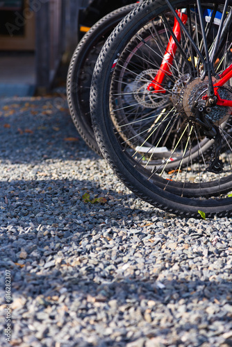 Adventurous spirit, recreation, and fitness symbolized in mountain bike tires on gravel stones