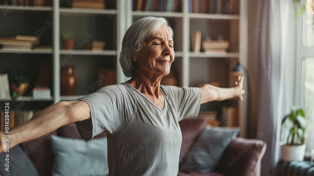 senior woman practicing gentle yoga stretches in her living room, promoting flexibility, mobility, and overall well-being. senior woman practicing gentle yoga stretches in her living room, promoting flexibility, mobility, and overall well-being.