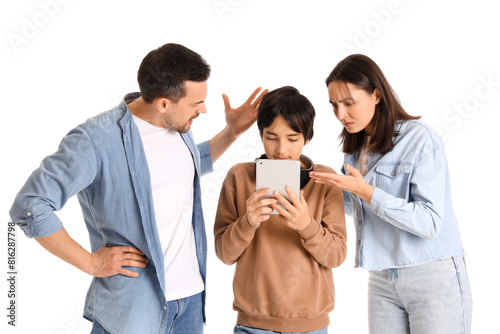 Teenage boy with tablet com...