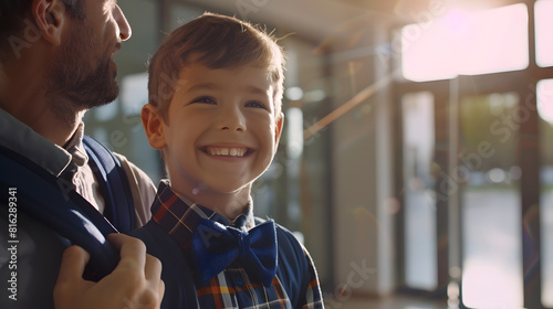 Father escorts happy firstgrader boy to school straightens his bow tie before classes : Generative AI photo