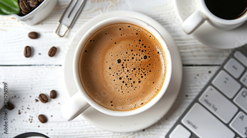 Coffee with isolated background and office accessories from above.