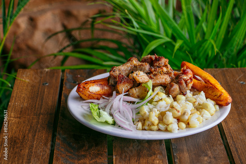Exquisite Ecuadorian fry with mote, banana and salad